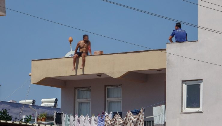 Polis çatıya çıkan adamı indirmek için uzun süre dil DÖKTÜ